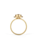 Geometric solitaire ring with circular detail and double band. 18ct yellow gold, textured gold. Side view.