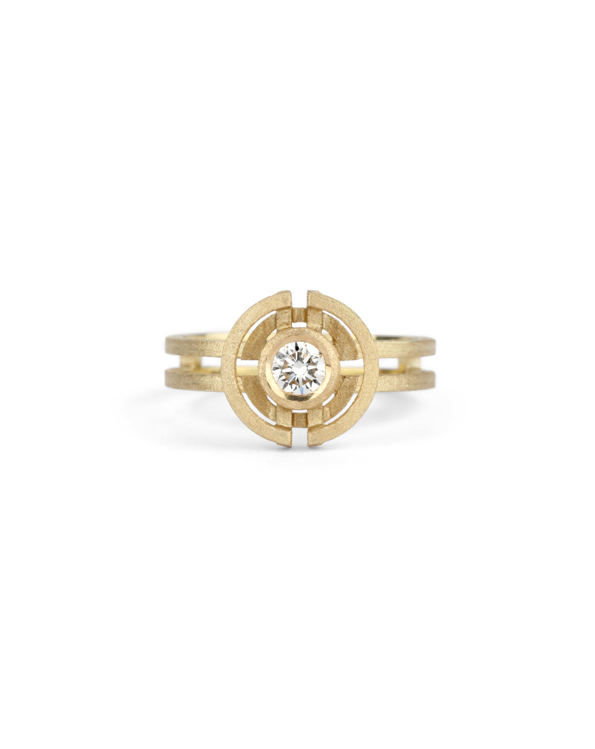 Geometric ring with a round white diamond and semicircle detail. 18ct yellow gold, textured finish.
