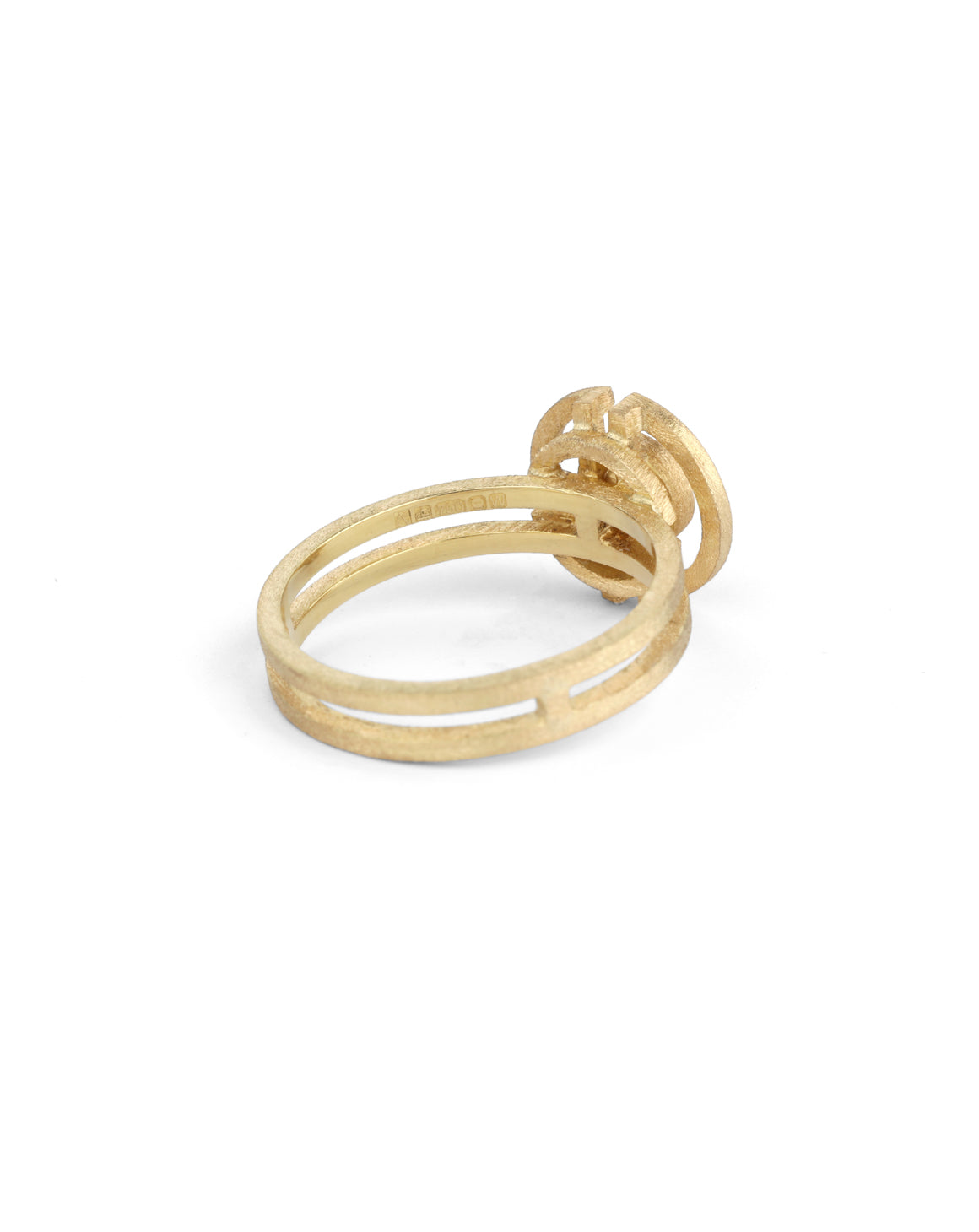 Geometric ring with a round white diamond and semicircle detail. 18ct yellow gold, textured finish. Back view.