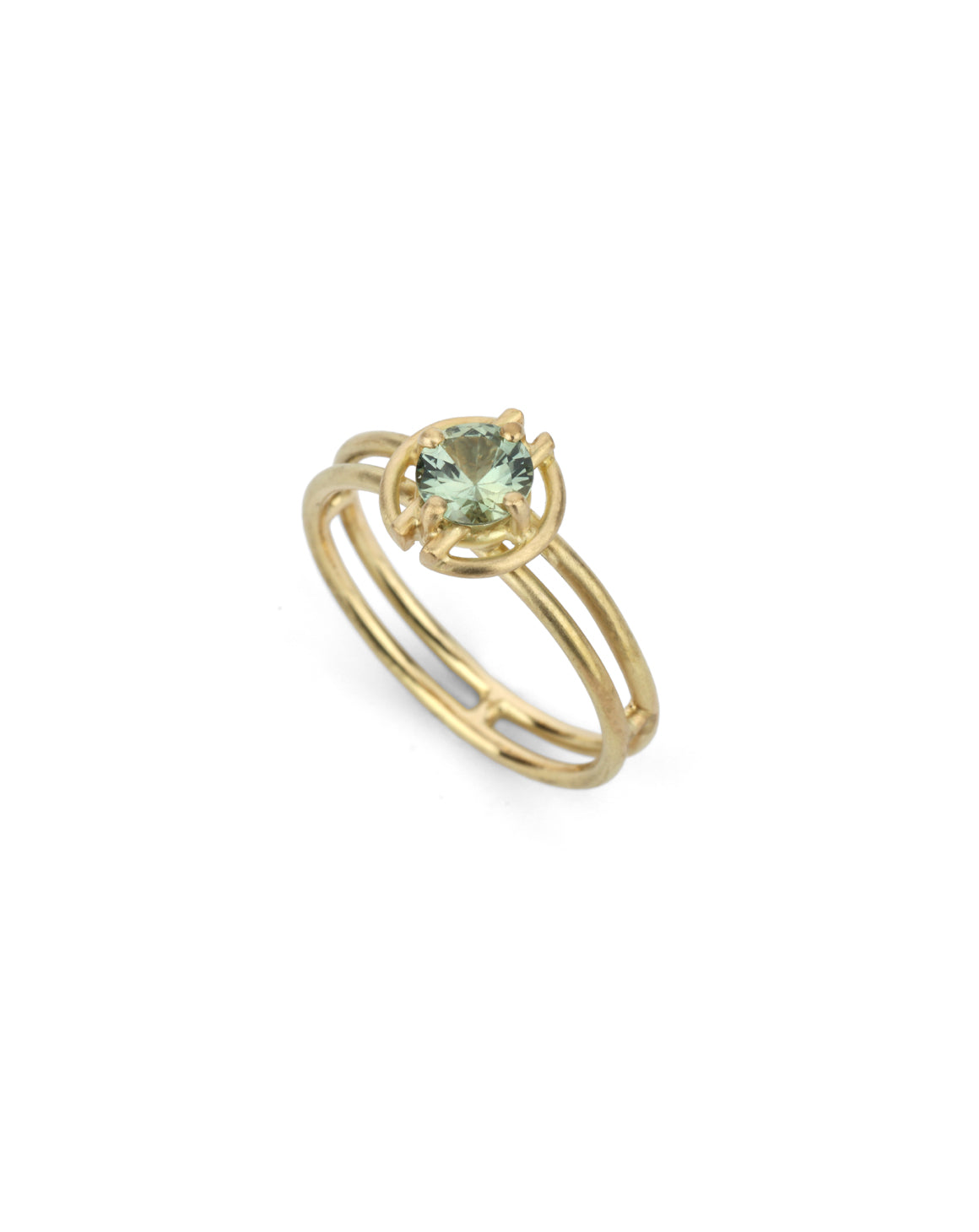 Round green sapphire ring with geometric detail. 18ct yellow gold, satin finish.