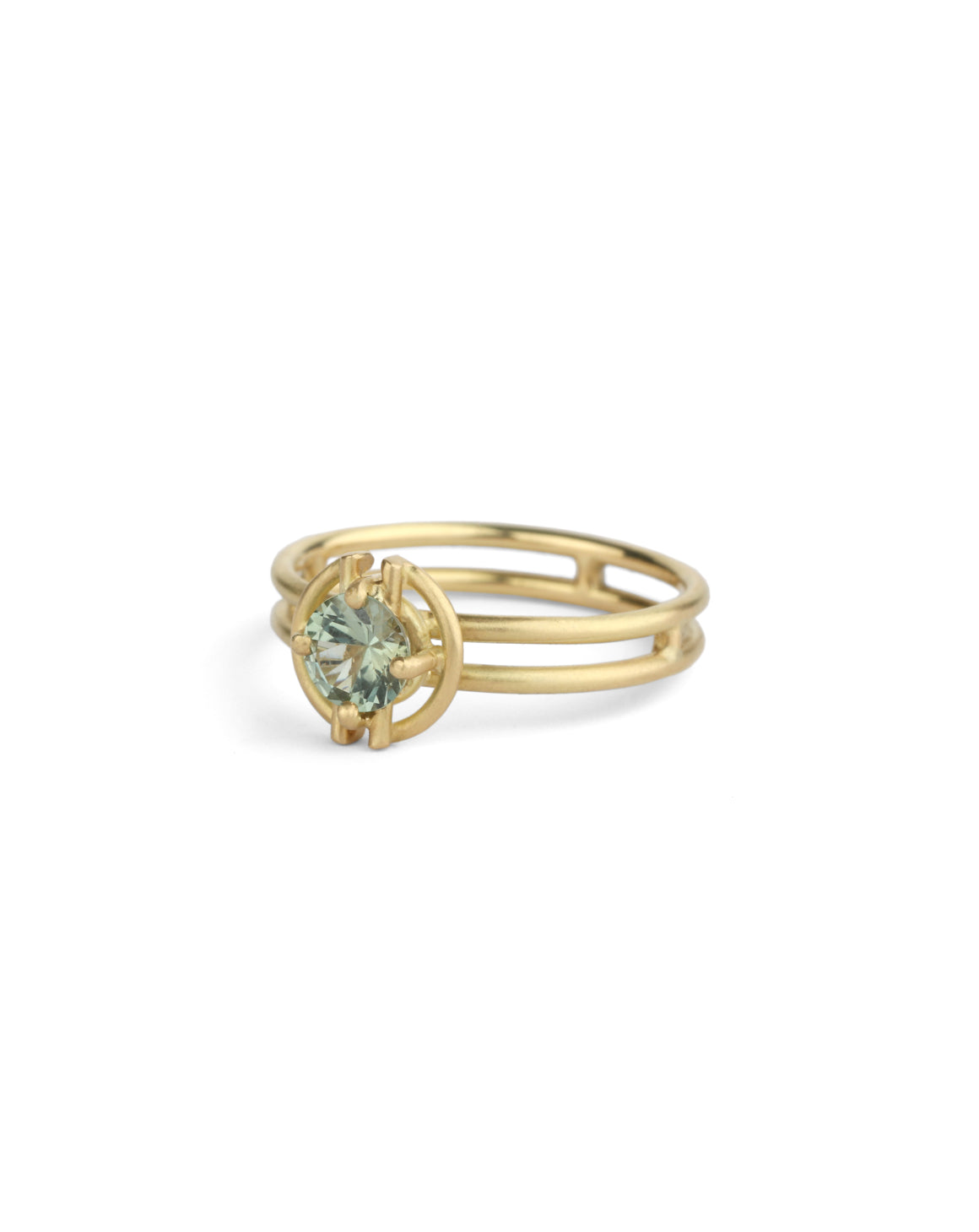 Round green sapphire ring with geometric detail. 18ct yellow gold, satin finish.