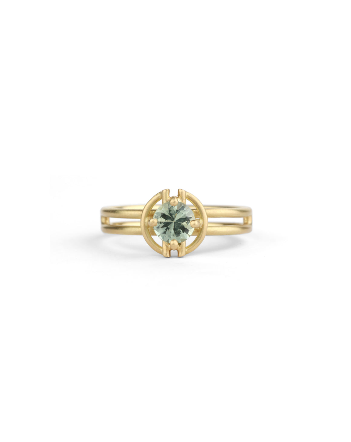 Round green sapphire ring with geometric detail. 18ct yellow gold, satin finish.