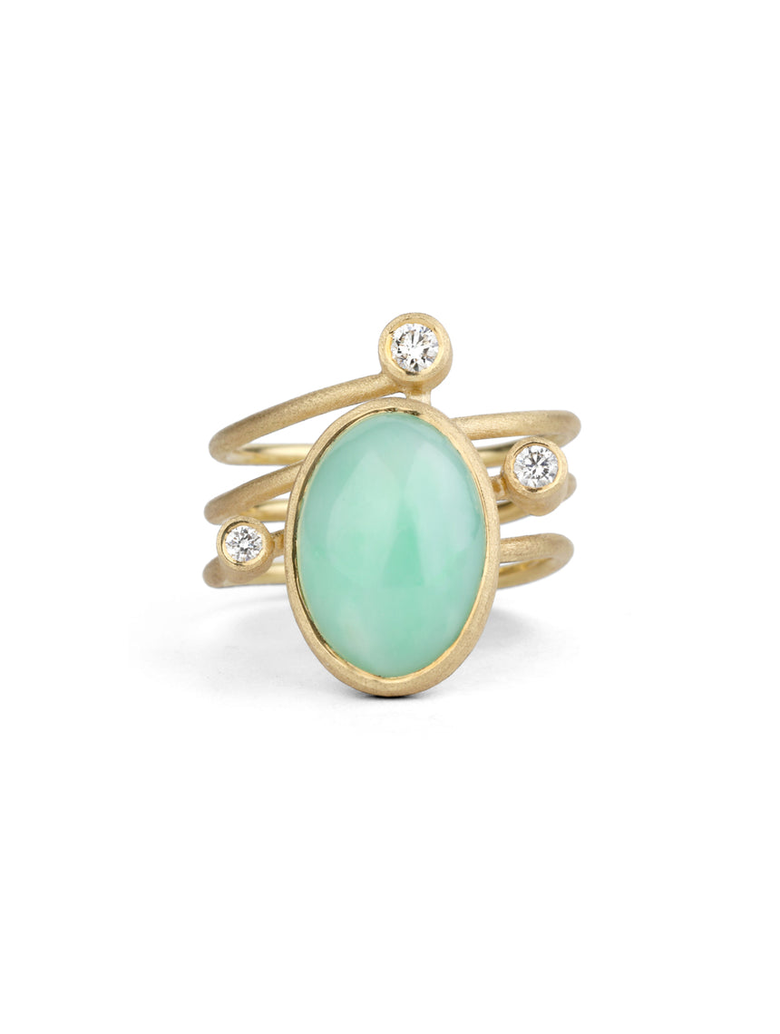Light green jadeite and white diamond statement ring. Spiral band, 18ct yellow gold, textured finish.