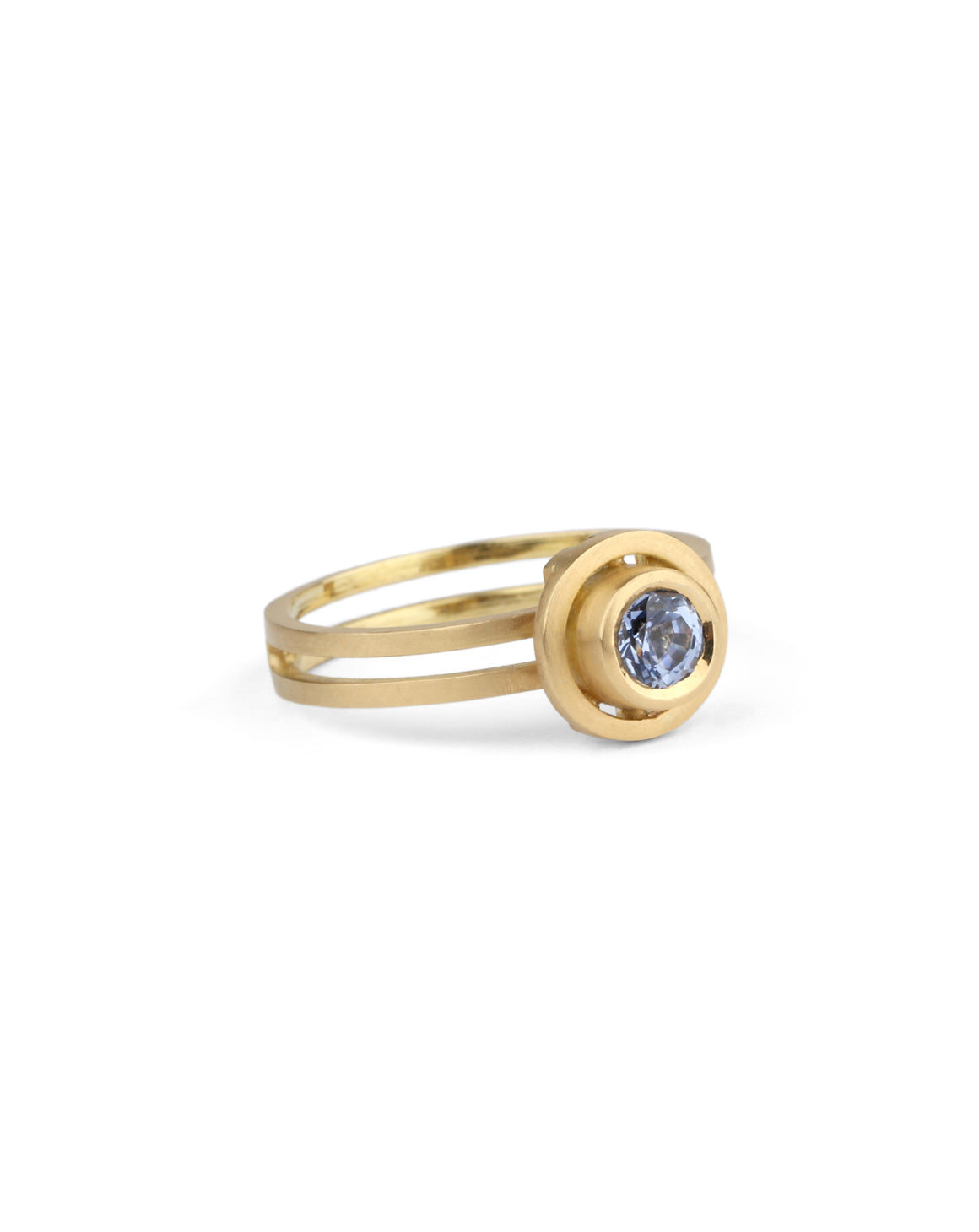 Light yellow sapphire ring with circular detail and double band. 18ct yellow gold, textured finish.