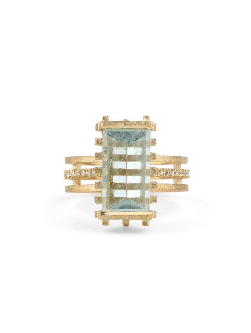 Mirror-cut aquamarine ring with diamond detail on the band, 18ct yellow gold.