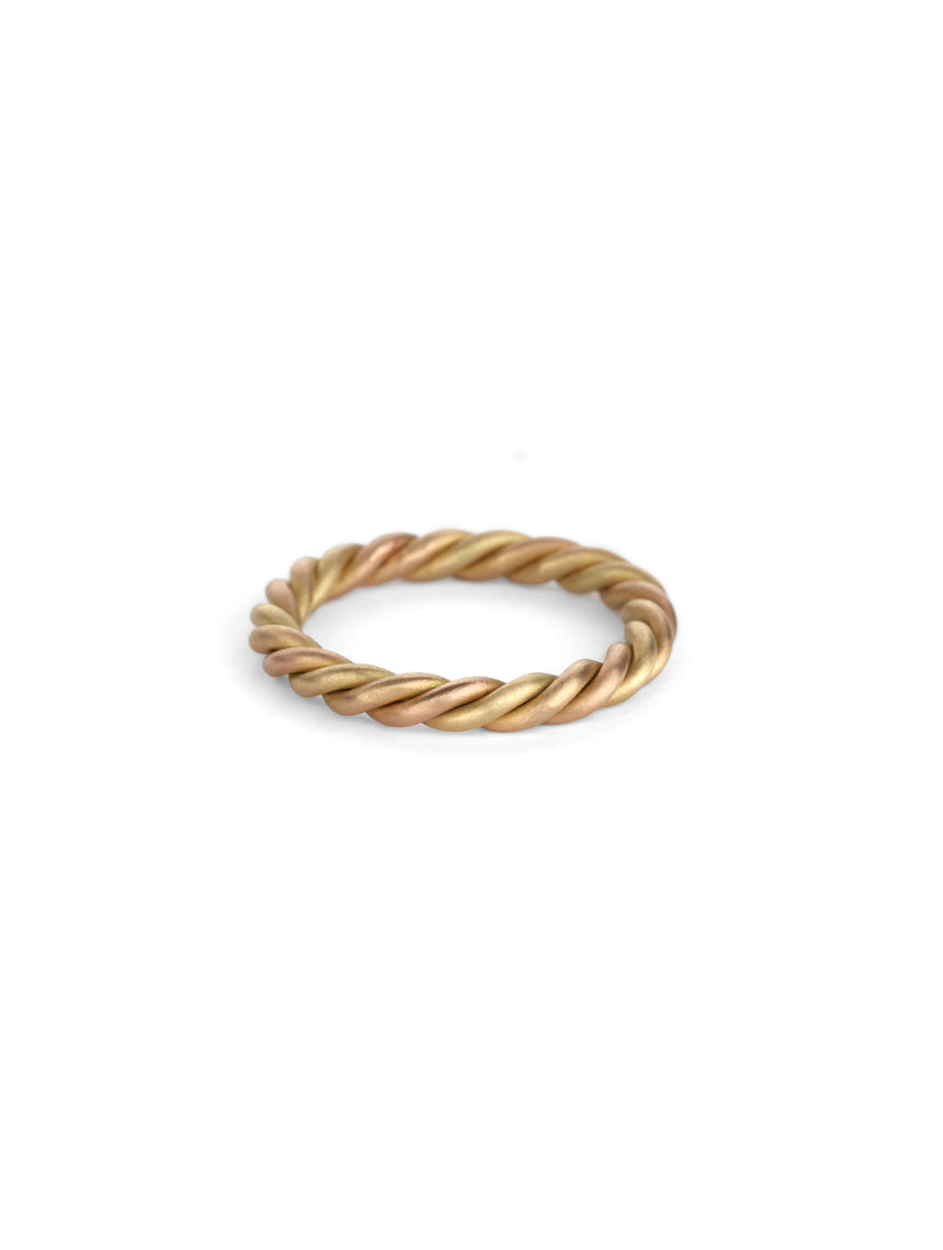 Rope style ring in 18ct yellow, rose and peach gold, satin finish.