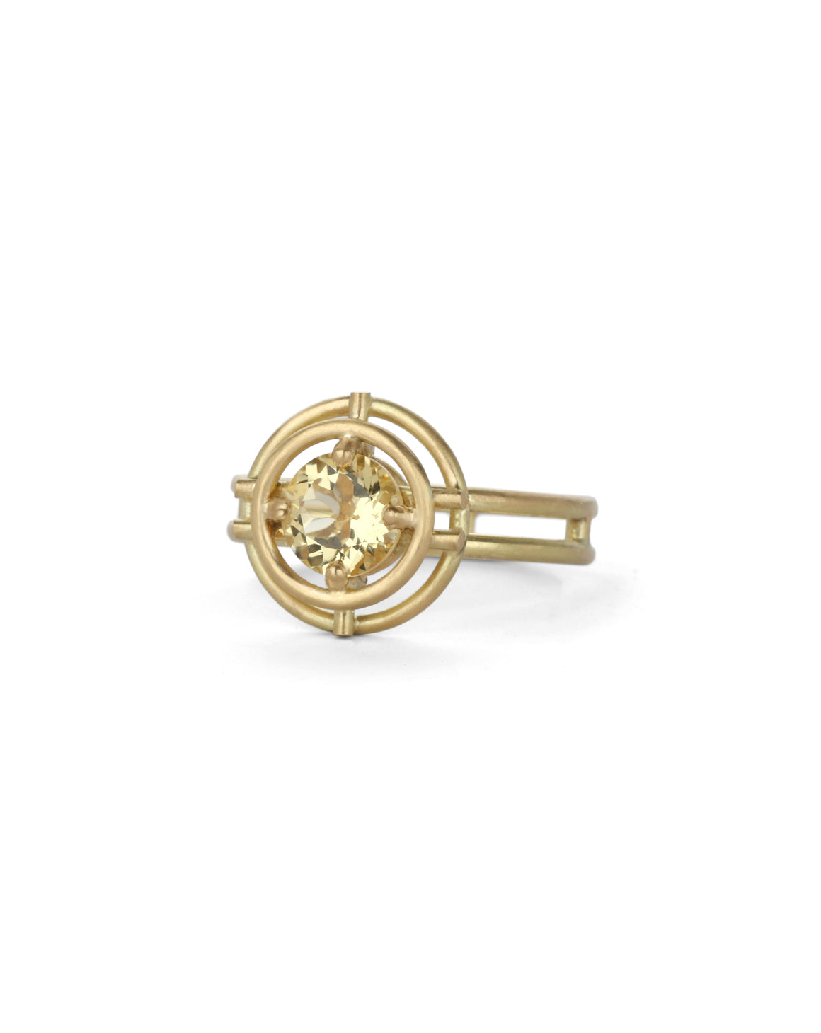 Geometric Ring with two concentric circles surrounding a yellow beryl. 18ct yellow gold, satin finish.