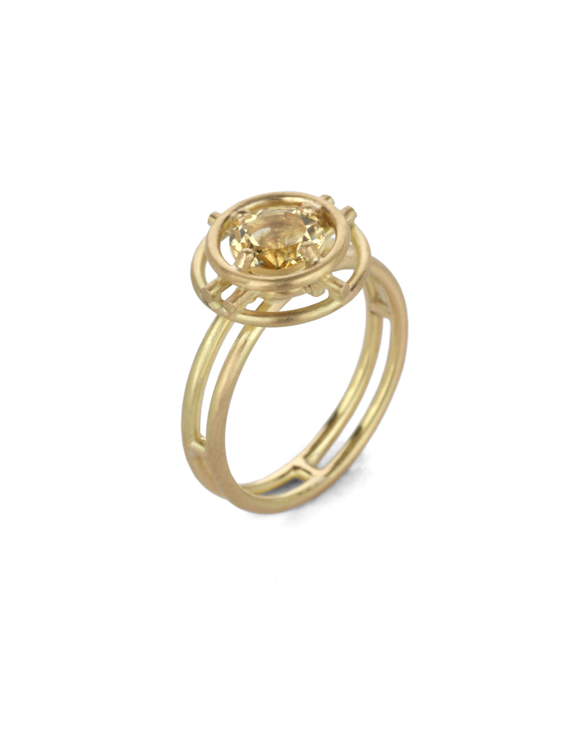Geometric Ring with two concentric circles surrounding a yellow beryl. 18ct yellow gold, satin finish.