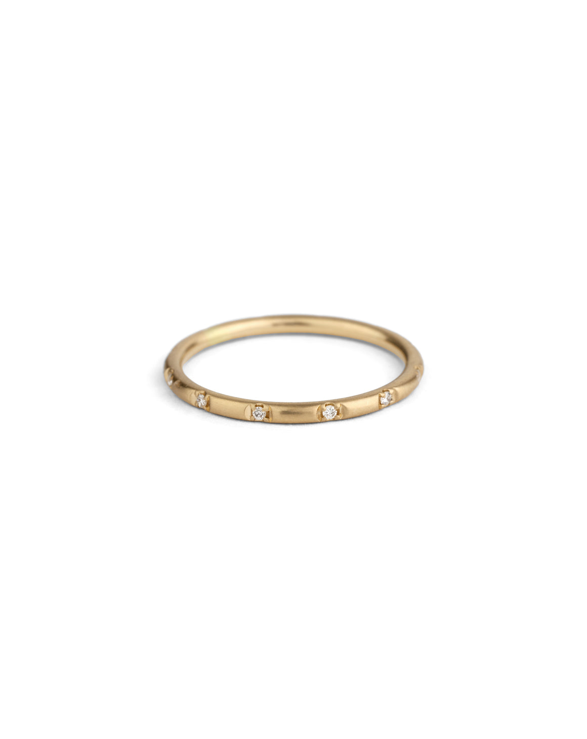 Rounded band set with tiny white diamonds. 18ct yellow gold, satin finish.